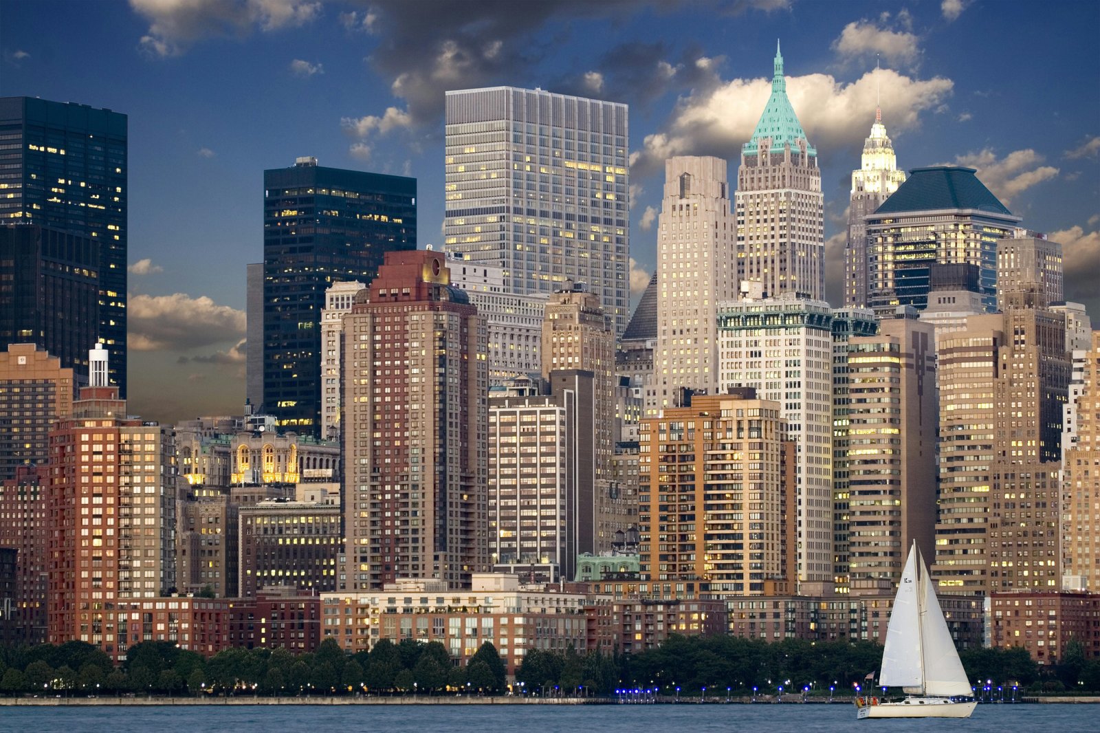 New York City skyline featuring the Trump Building and surrounding skyscrapers during the day
