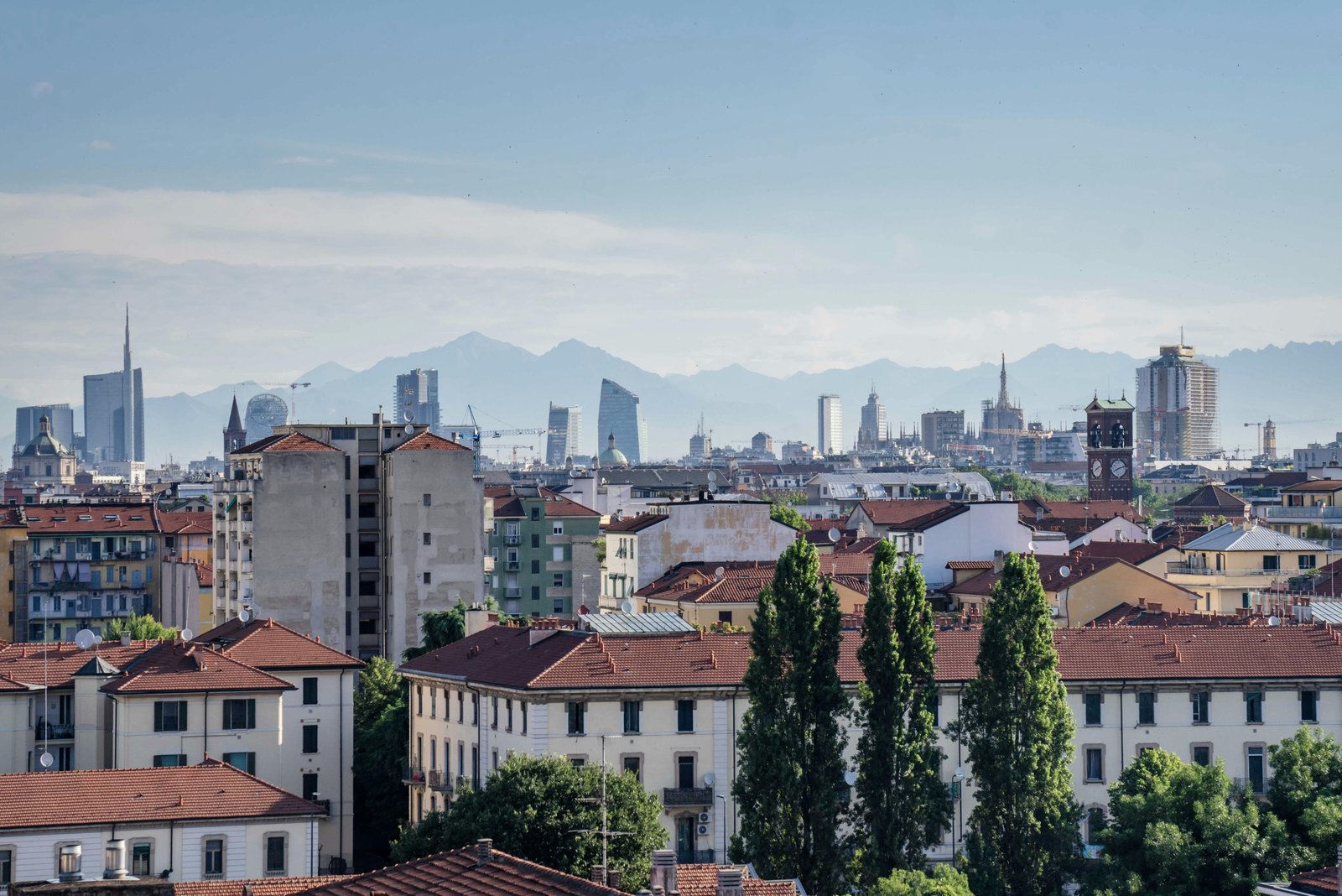Milan skyline with Italian architecture and city buildings under a clear sunny sky