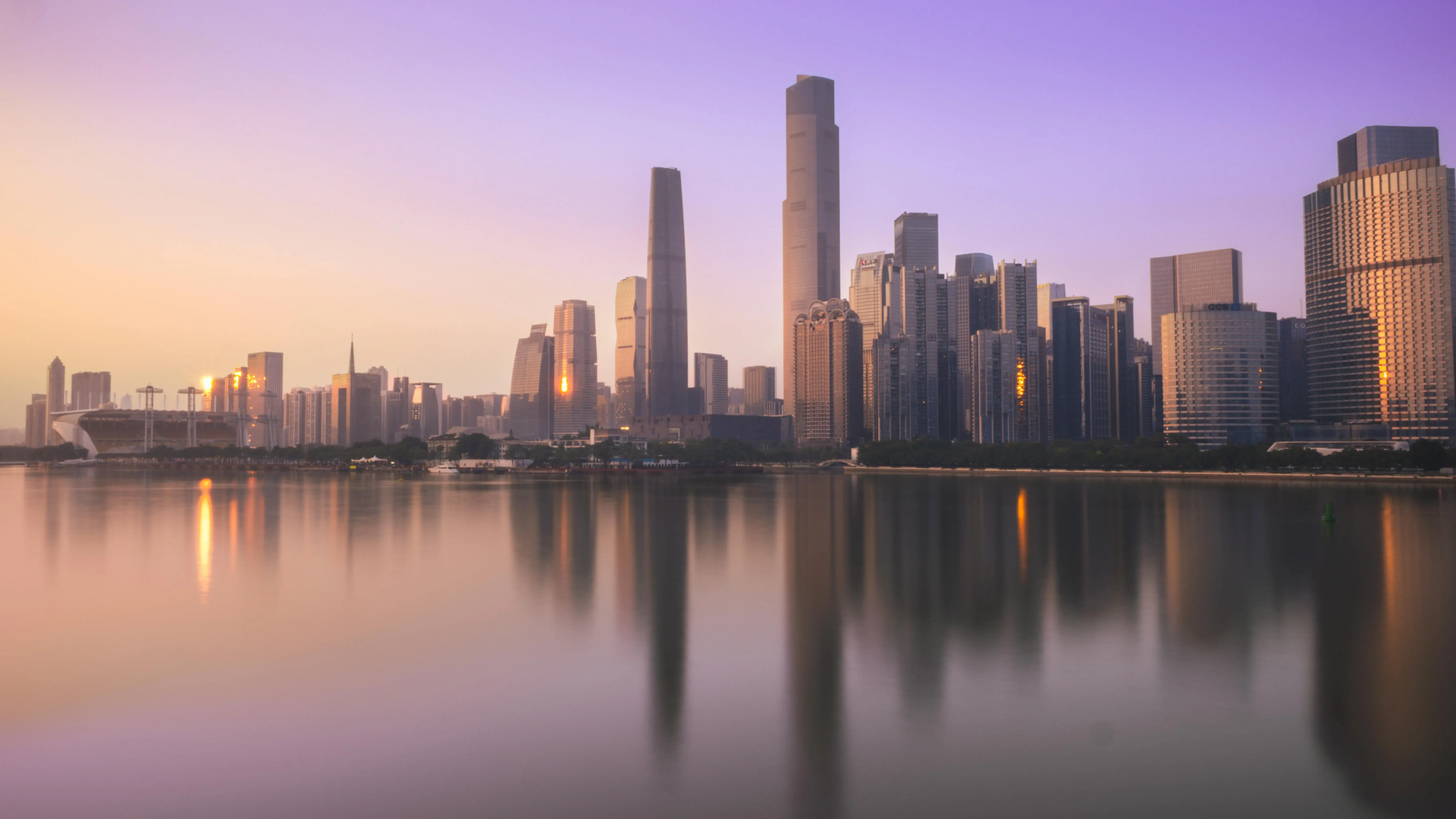 Guangzhou CTF Finance Centre skyscraper at sunset