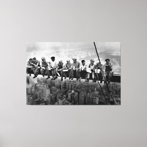 Canvas print featuring a famous image workers having a lunch break on a steel beam atop the Empire State Building in 1932