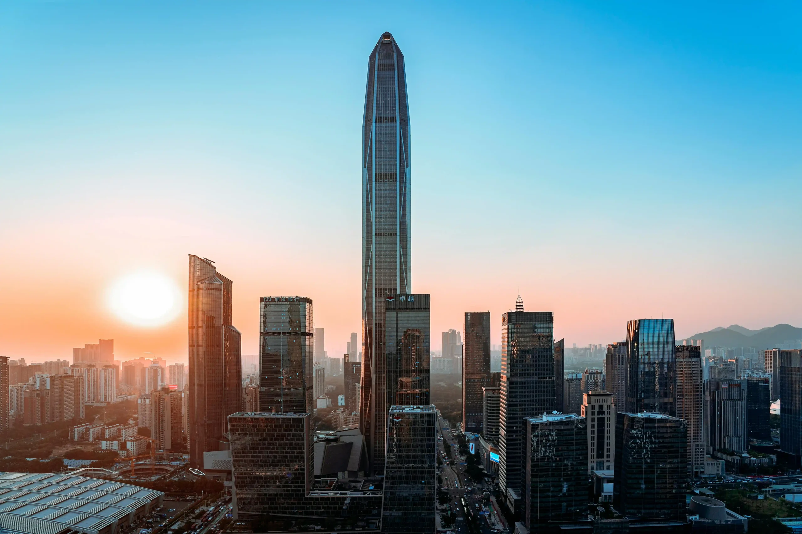10 Tallest Buildings in the World (2025) Ping An Finance Center towering over Shenzhen at sunset.