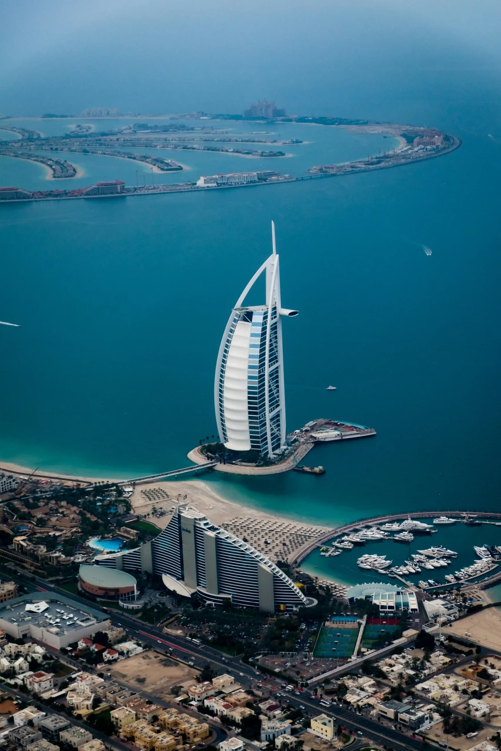 Burj Al Arab: Dubai’s Icon of Ultimate Luxury and Architectural Brilliance Burj Al Arab: Dubai’s Icon of Ultimate Luxury and Architectural Brilliance aerial view of the burj al arab scaled